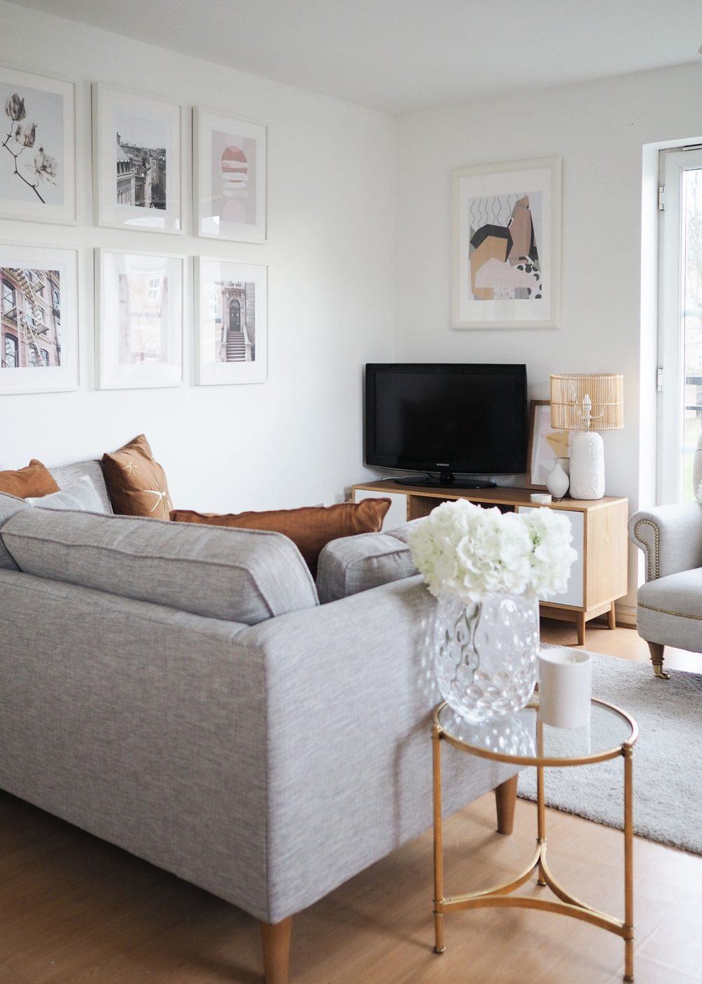 white rented living room decor with grey Cricket Sofology sofa